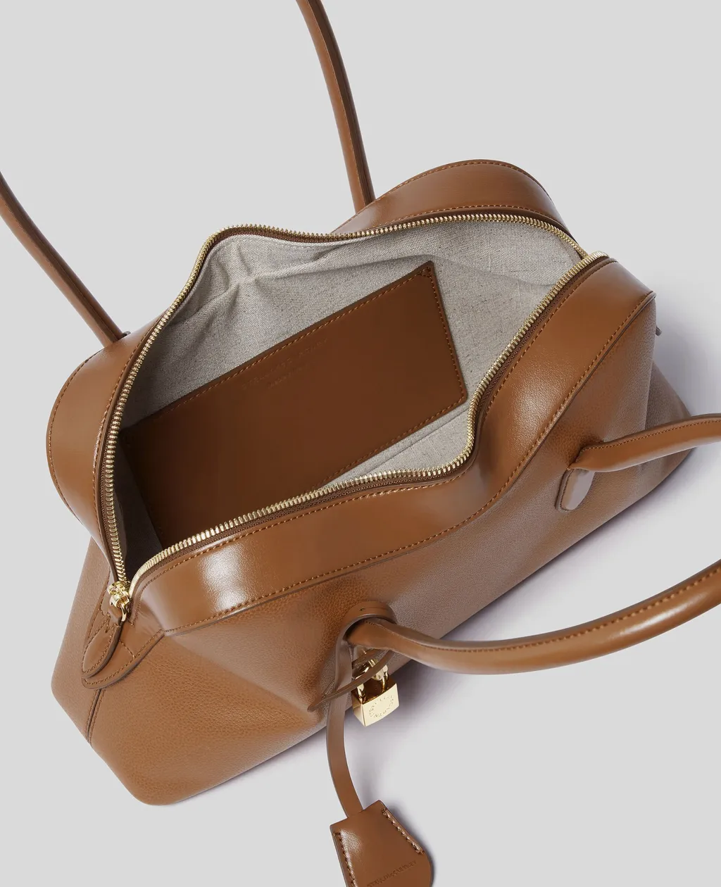 Stella Ryder Lock Plaque Shoulder Bag
