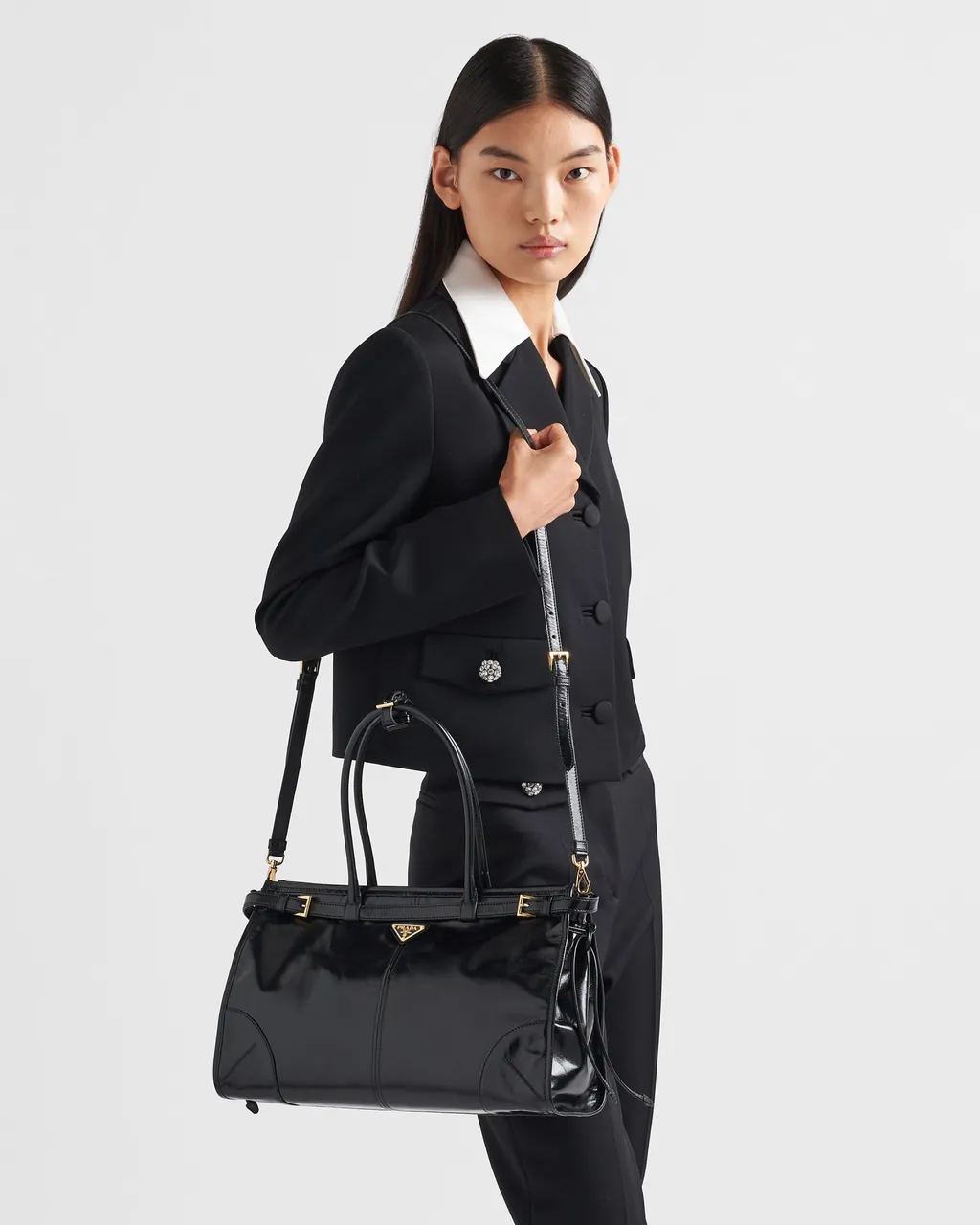 Triangle-Logo Drawstring Shoulder Bag