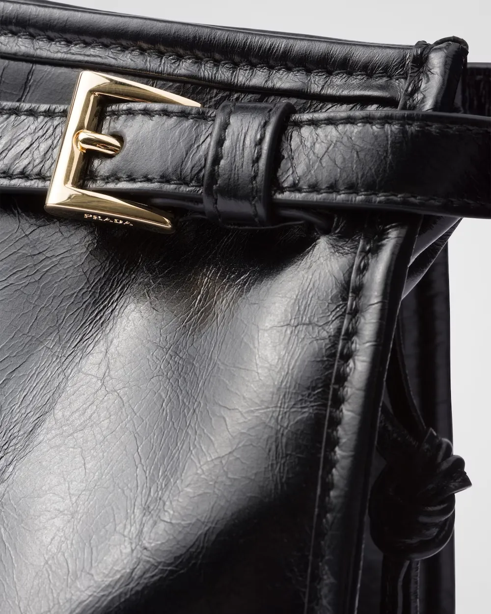 Triangle-Logo Drawstring Shoulder Bag