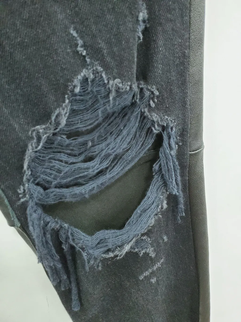 Ripped Jeans With Leather Details
