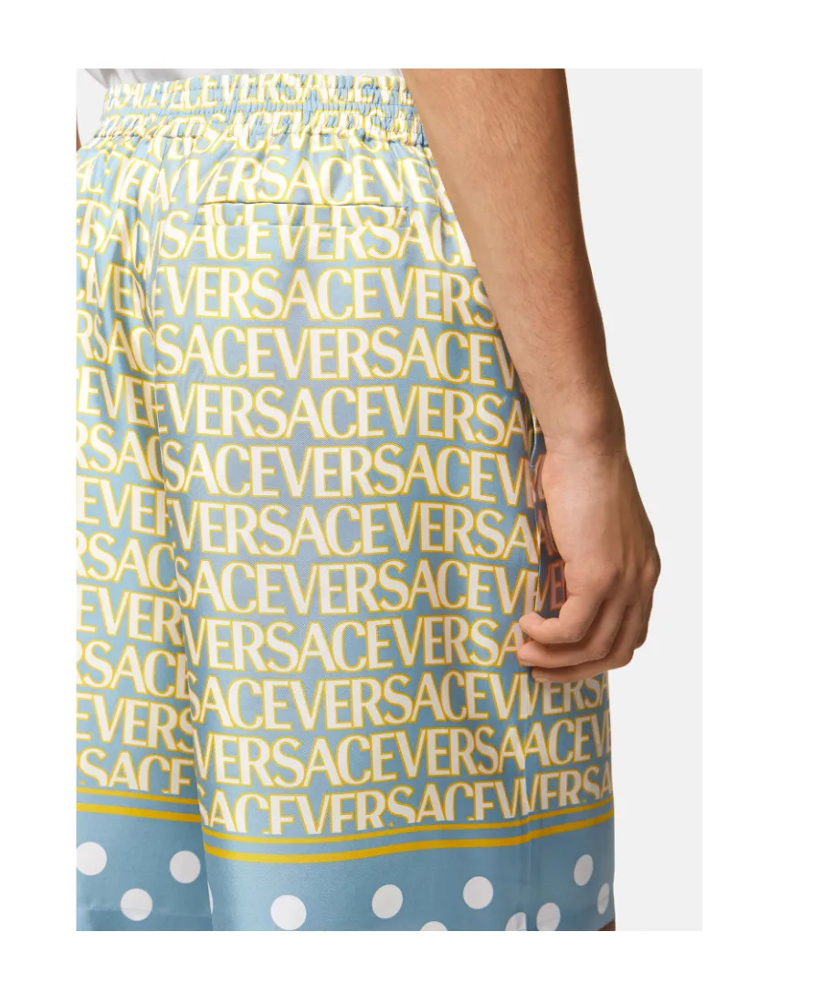 All-Over Logo Printed Knee-Length Shorts