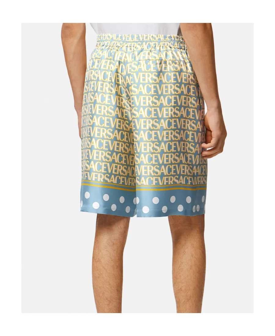 All-Over Logo Printed Knee-Length Shorts