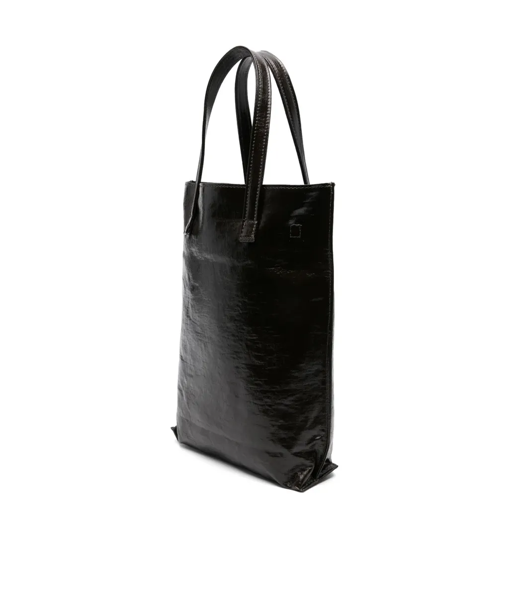 Carry A Handbag With Both Hands