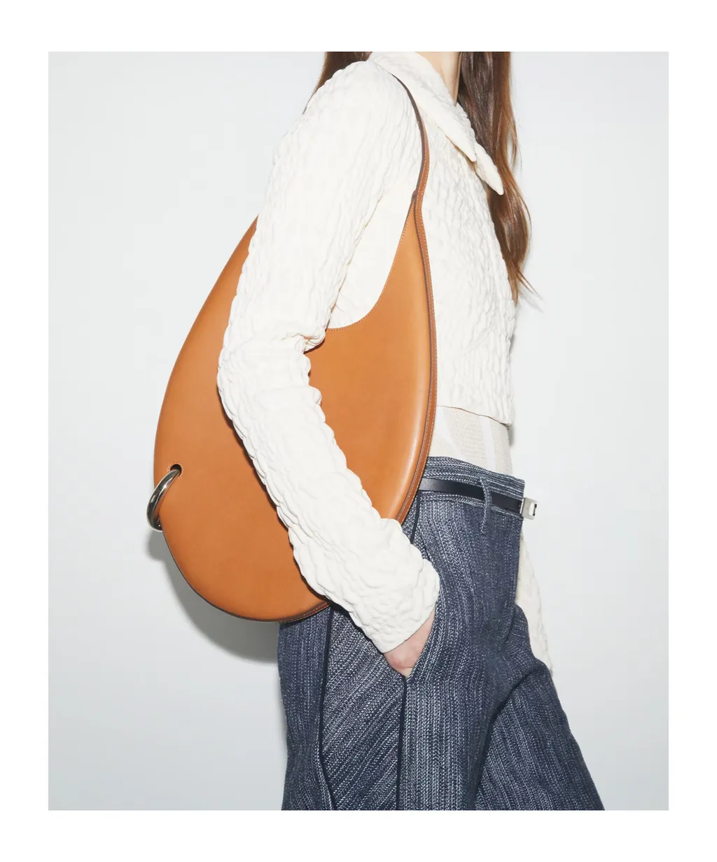 Pierced Leather Shoulder Bag