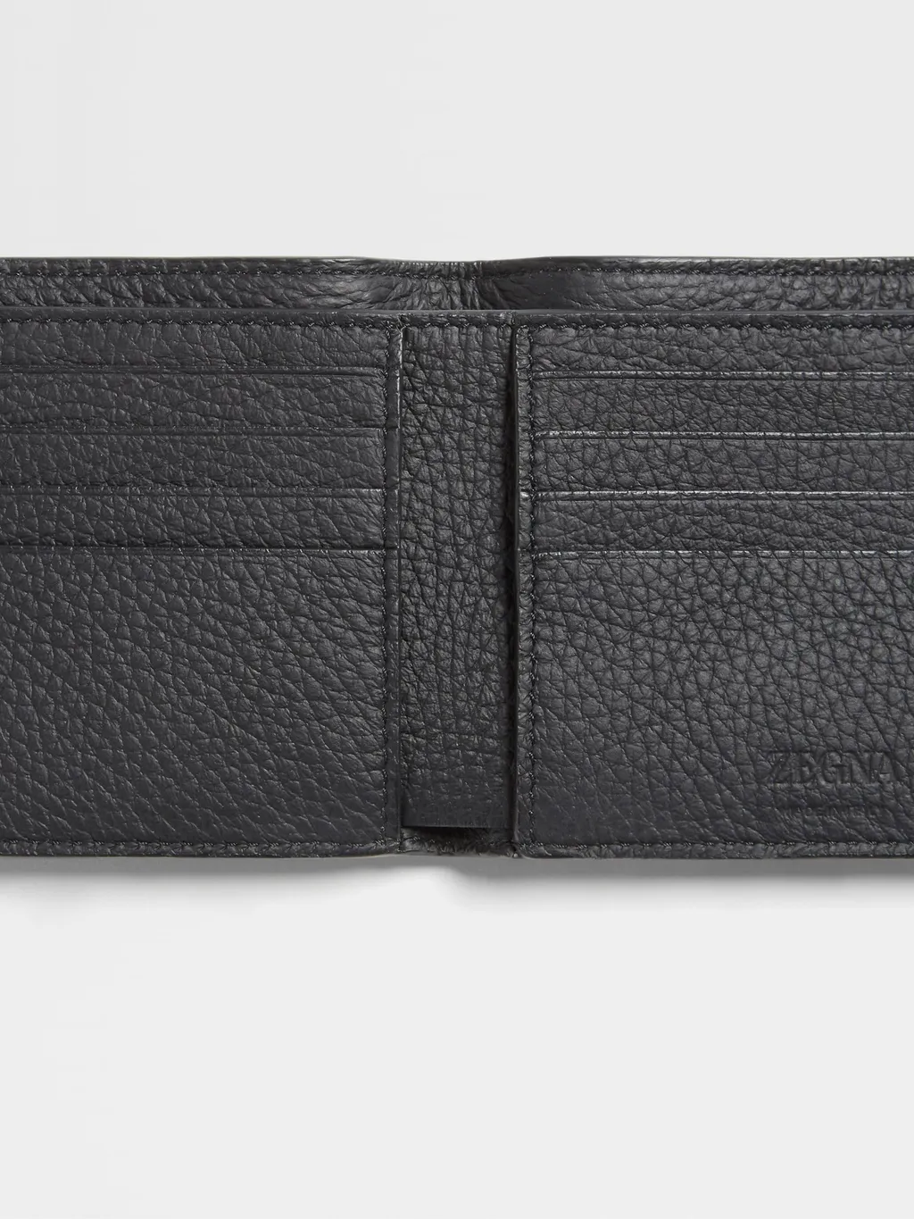 Embossed Bi-Fold Wallet