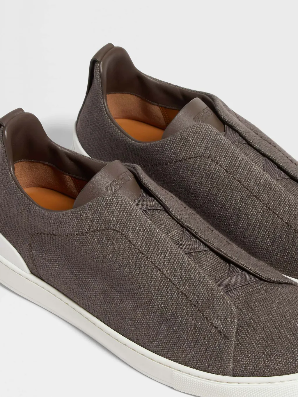 Triple Stitch Sneakers