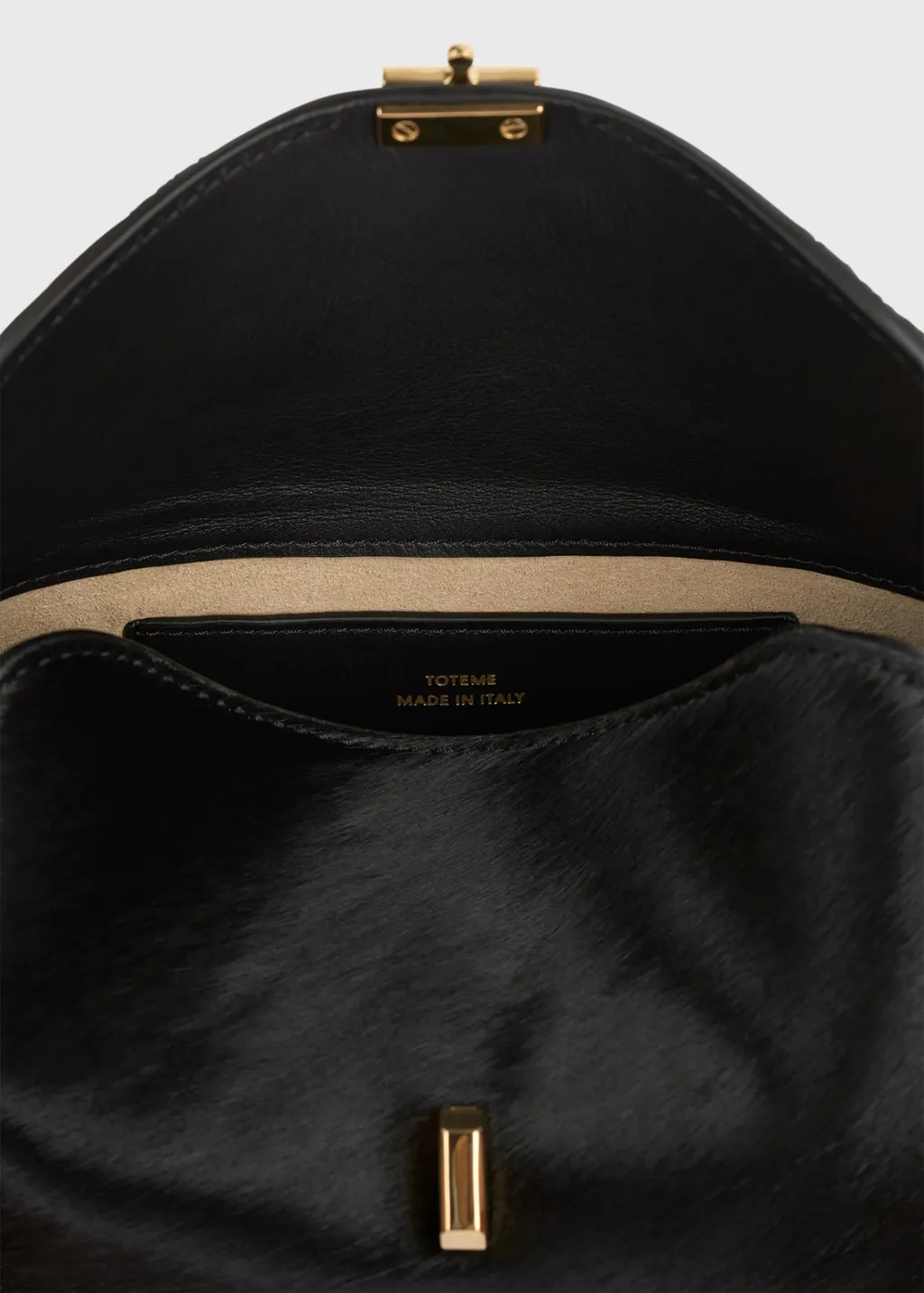 Pony Hair T-Lock Clutch