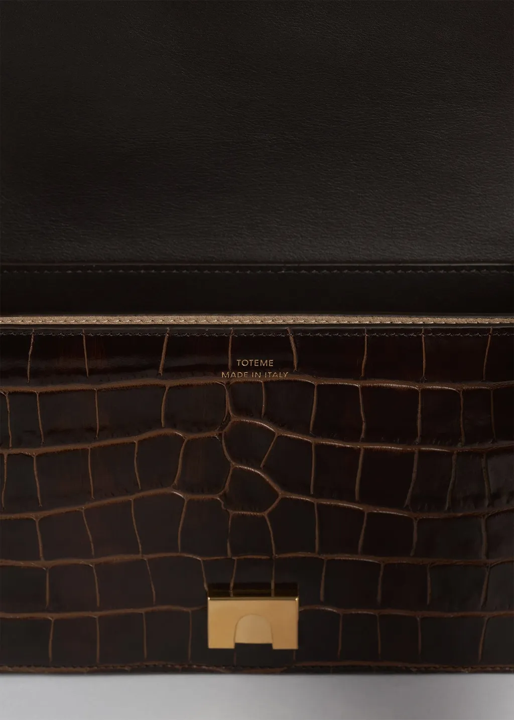 T-Flap Embossed Crossbody Bag
