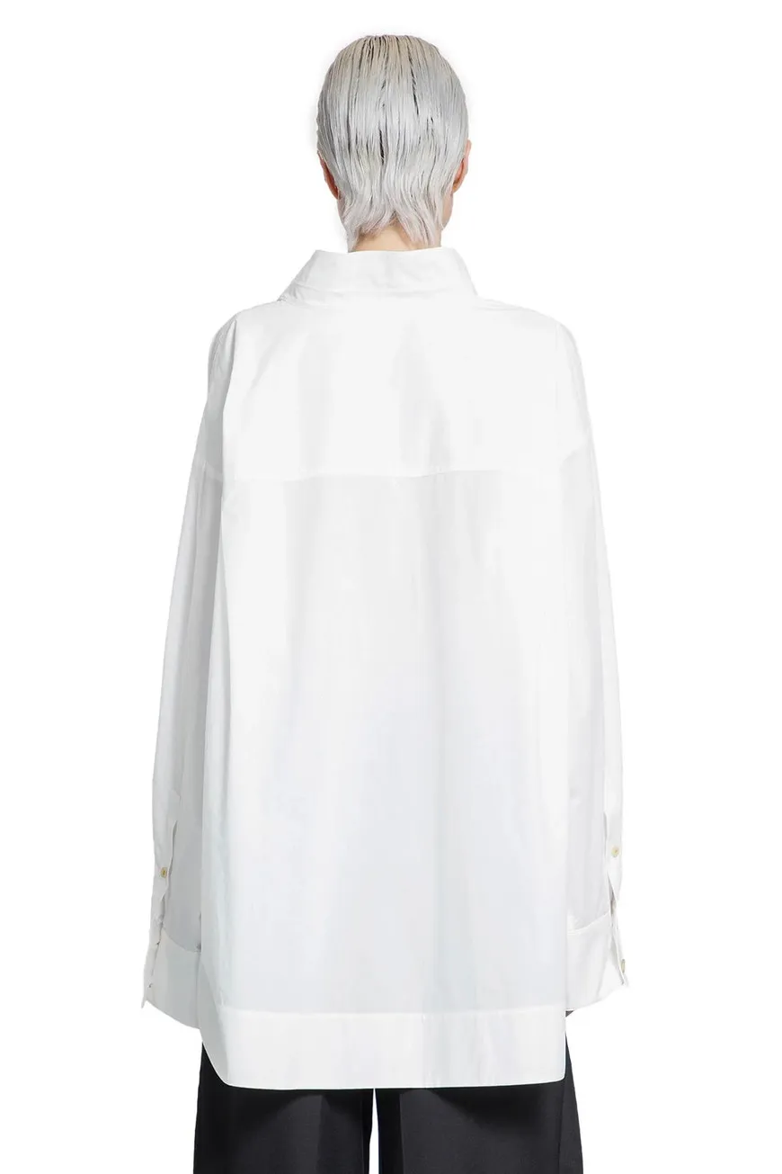 The Tito Curved Hem Top