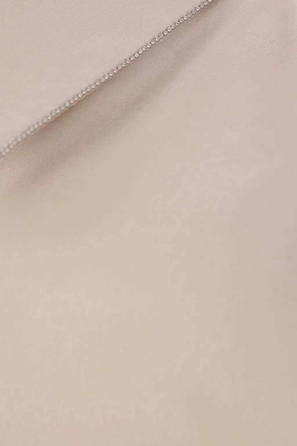 Sleeveless Curved Hem Shirt