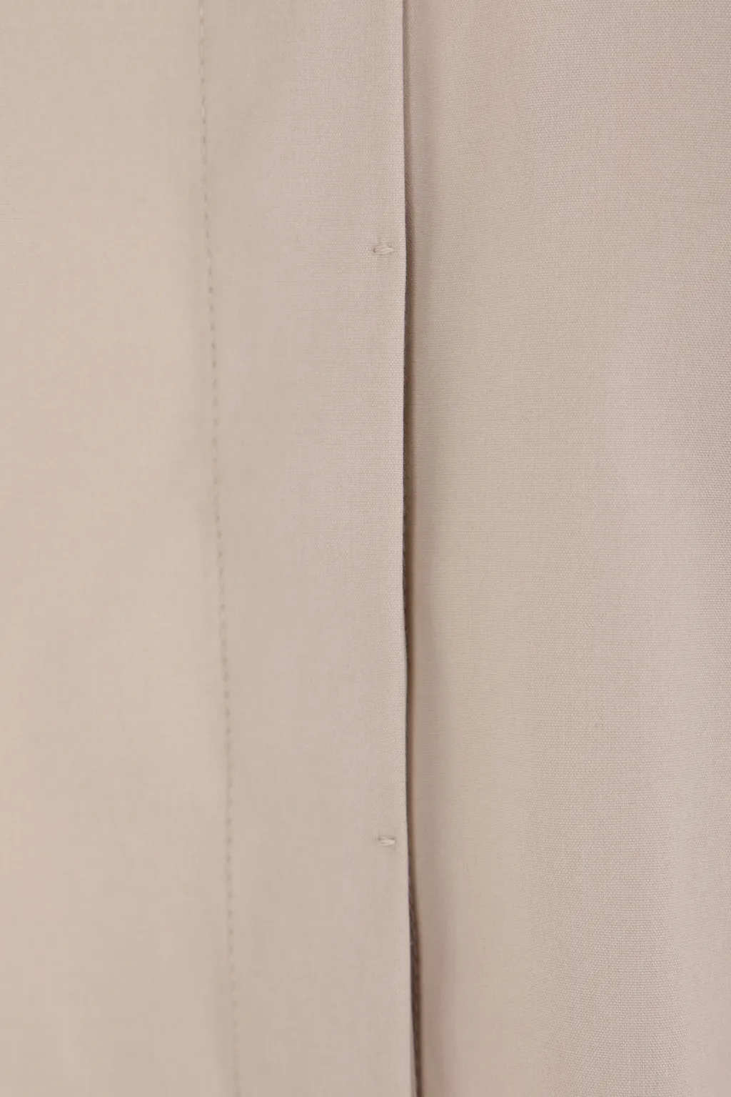 Sleeveless Curved Hem Shirt