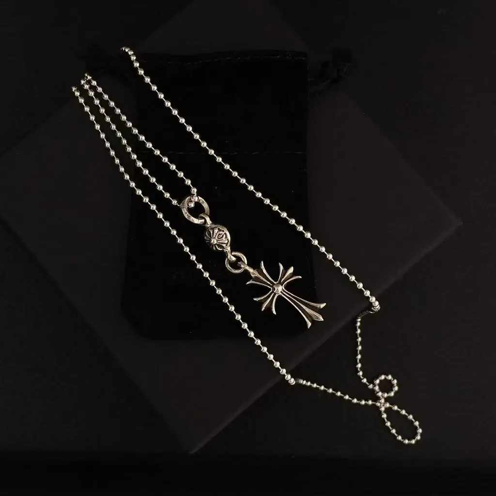 Single Ball Cross Necklace