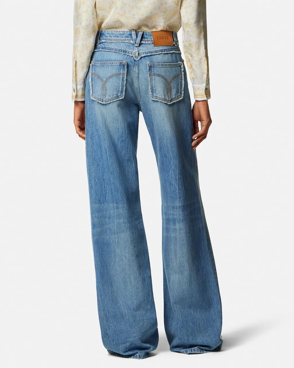 Logo-Patch Fringed Jeans