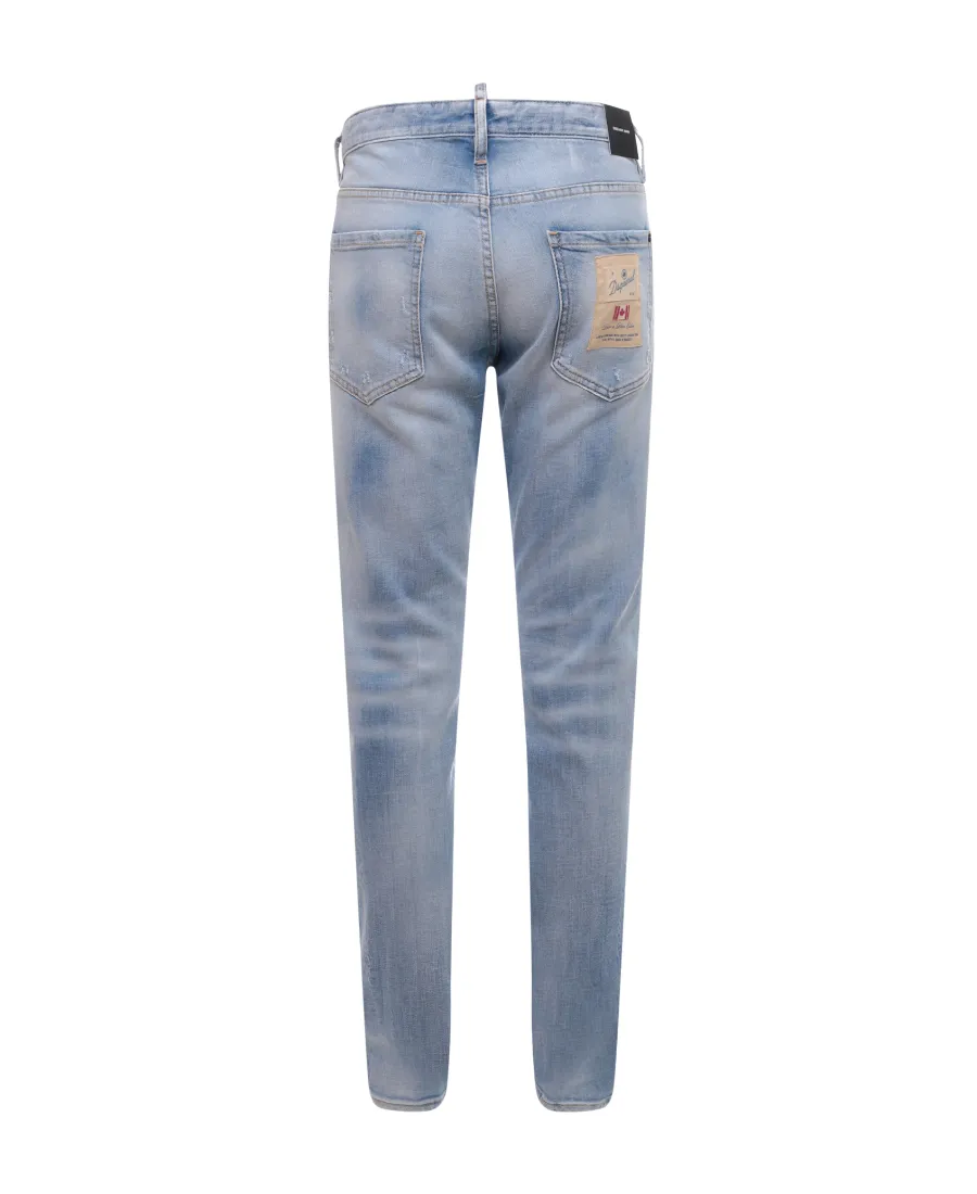 Logo Patch Distressed Tapered-Leg Jeans