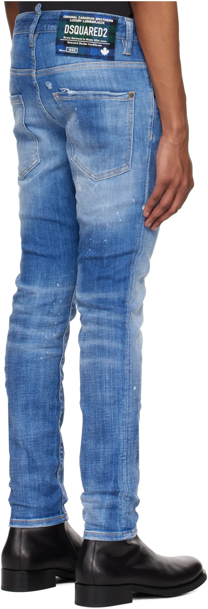 Distressed Tapered-Leg Skinny Jeans
