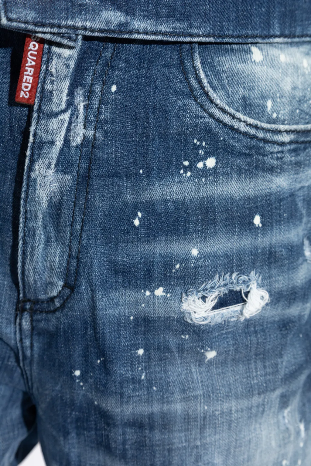 Distressed Tapered Leg Jeans