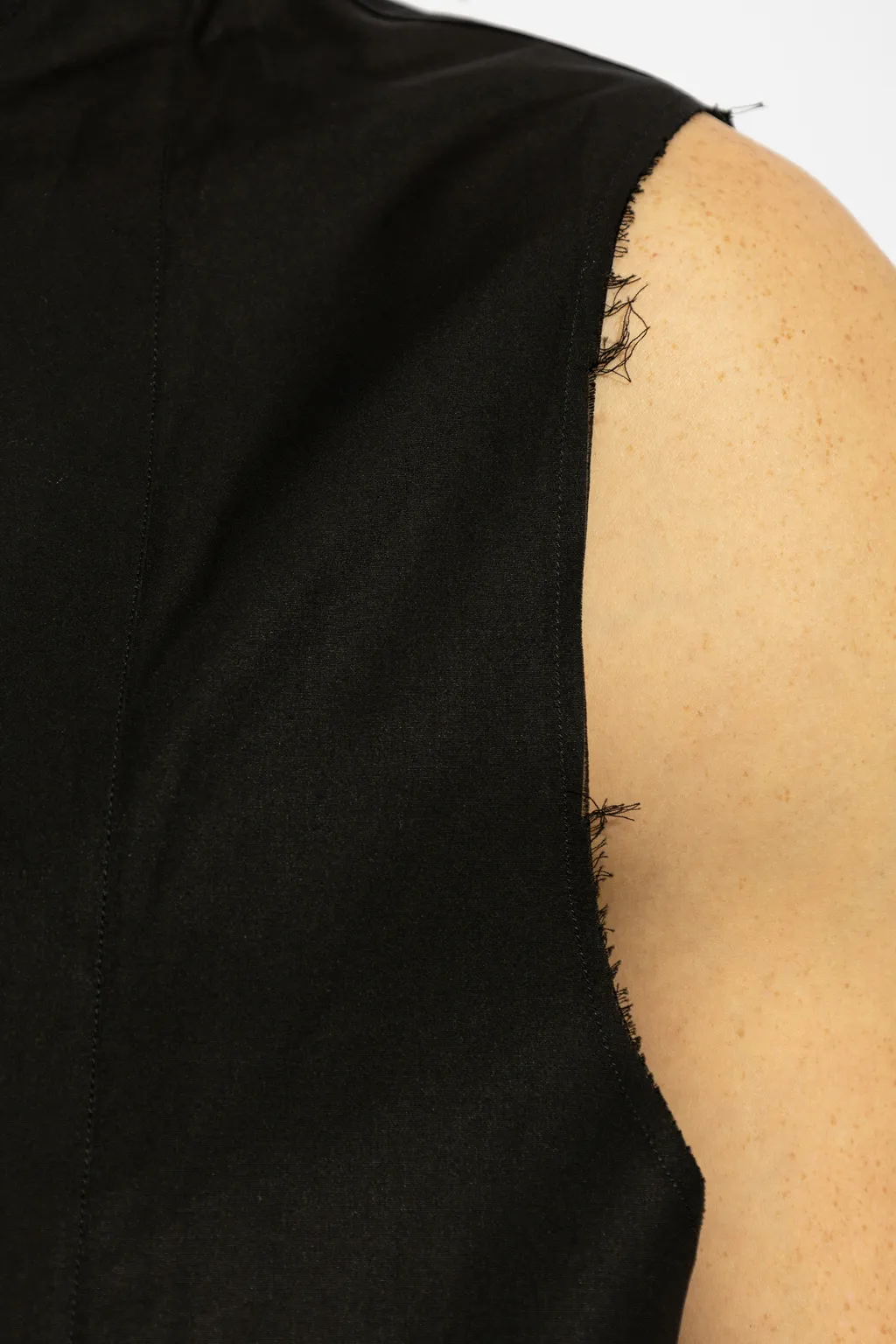 Curved Hem Sleeveless Shirt