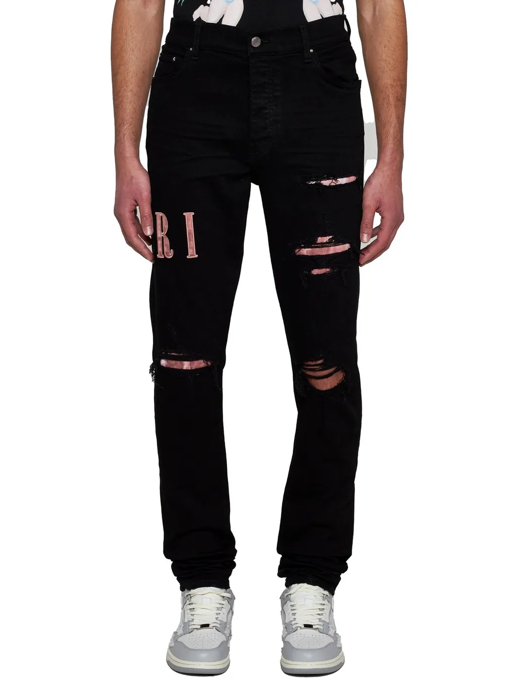 Logo Patch Distressed Skinny Jeans