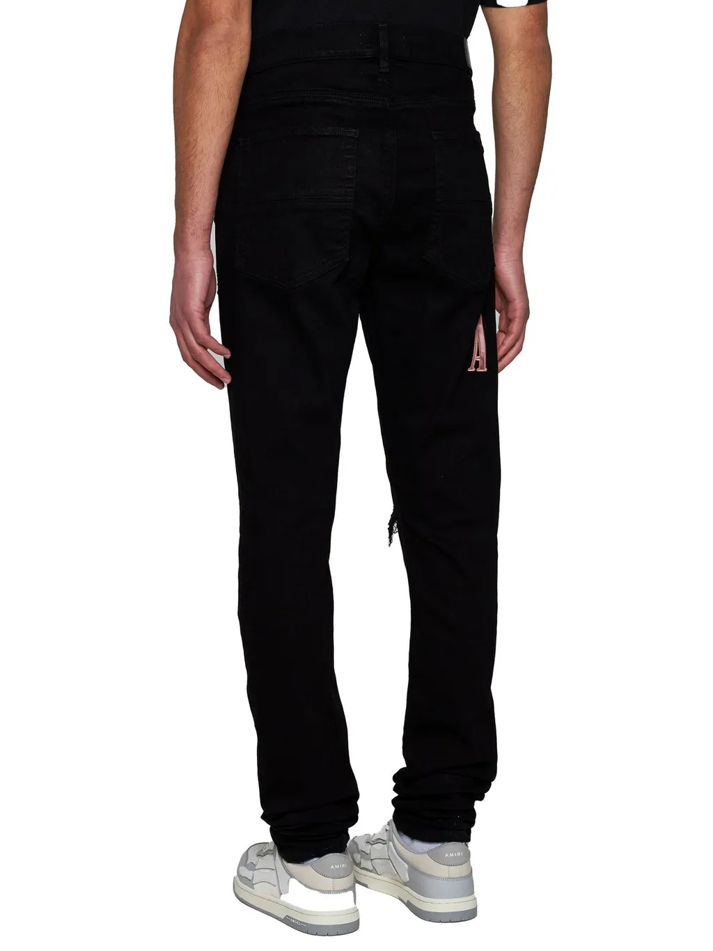 Logo Patch Distressed Skinny Jeans