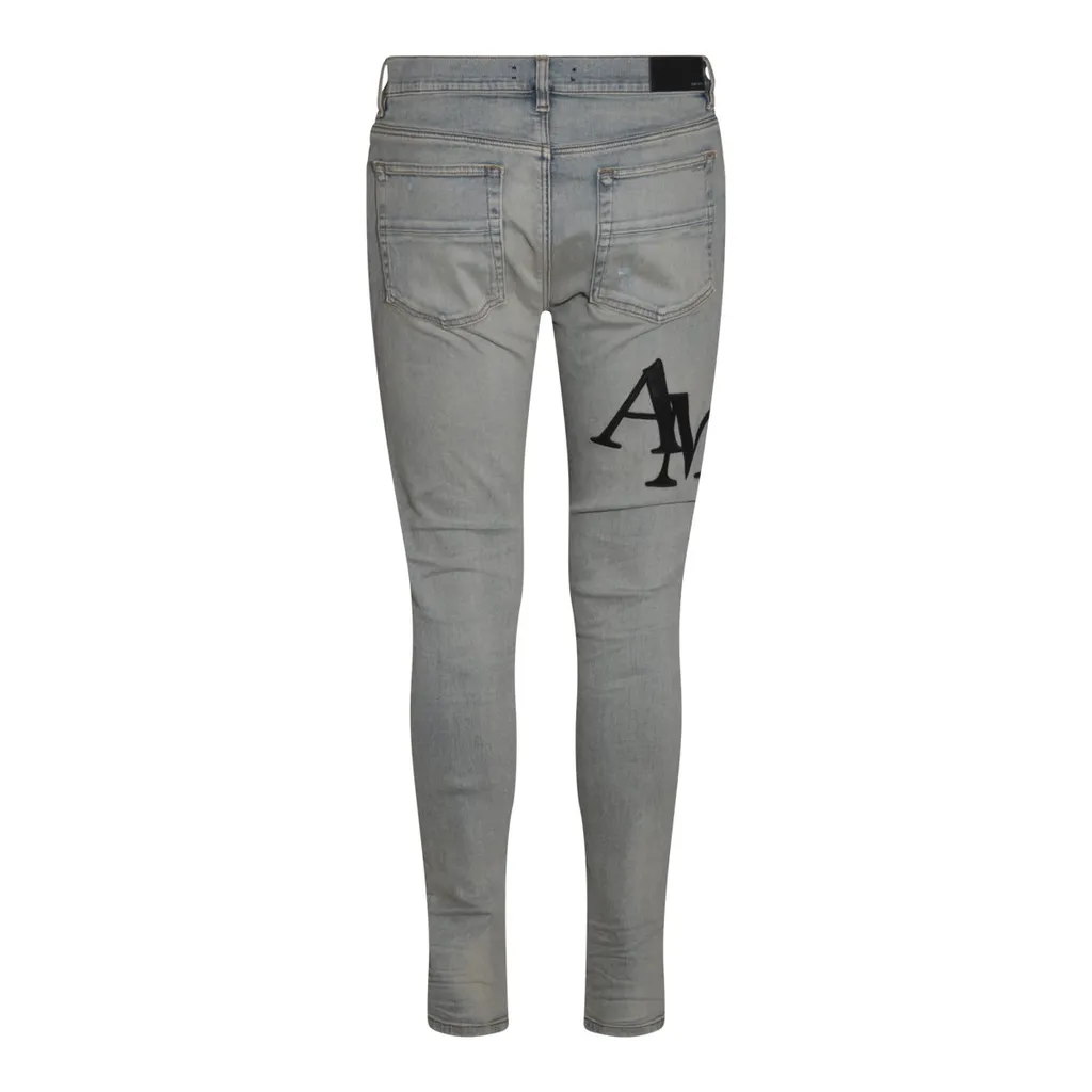 Logo Embroidered Distressed Skinny Jeans