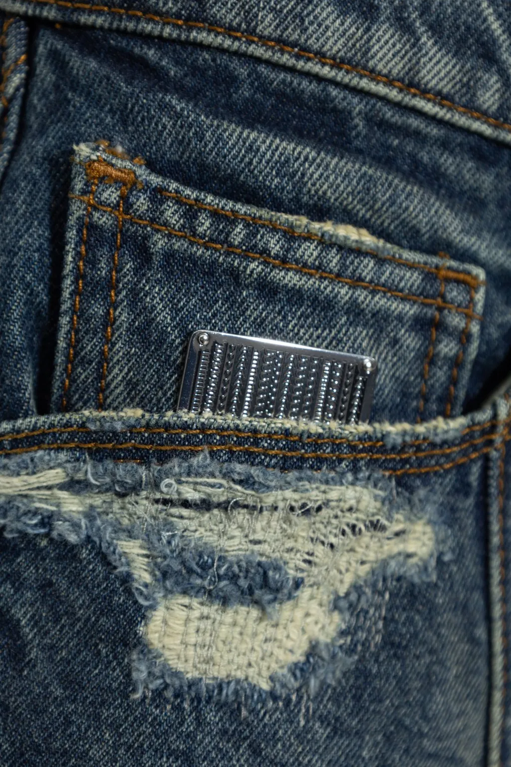 Denim Skirt With Distressed Details And Flared Hem