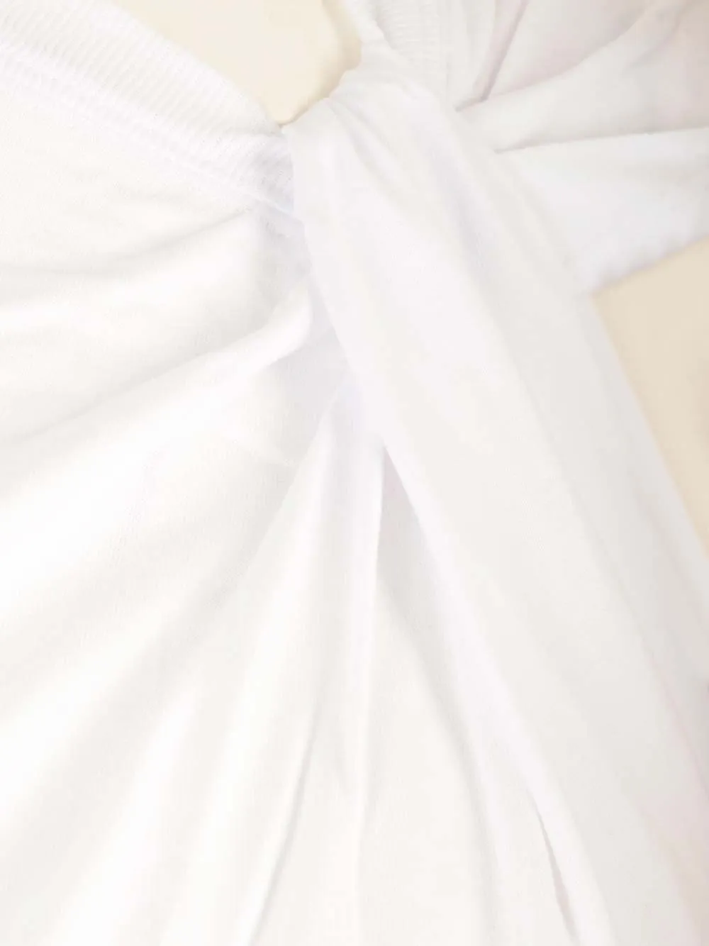 Asymmetric Knot Top