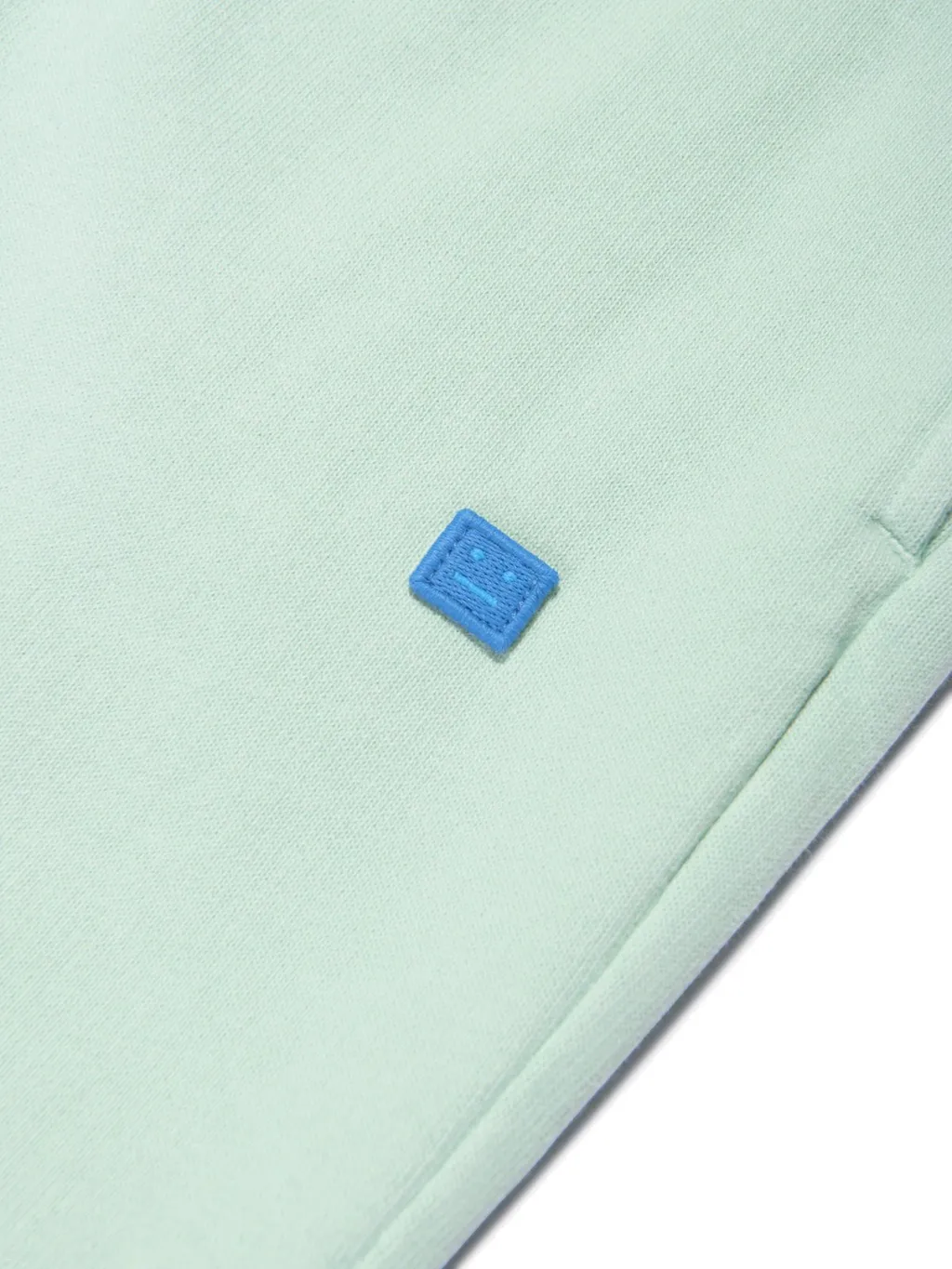 Face Motif Sweatpants