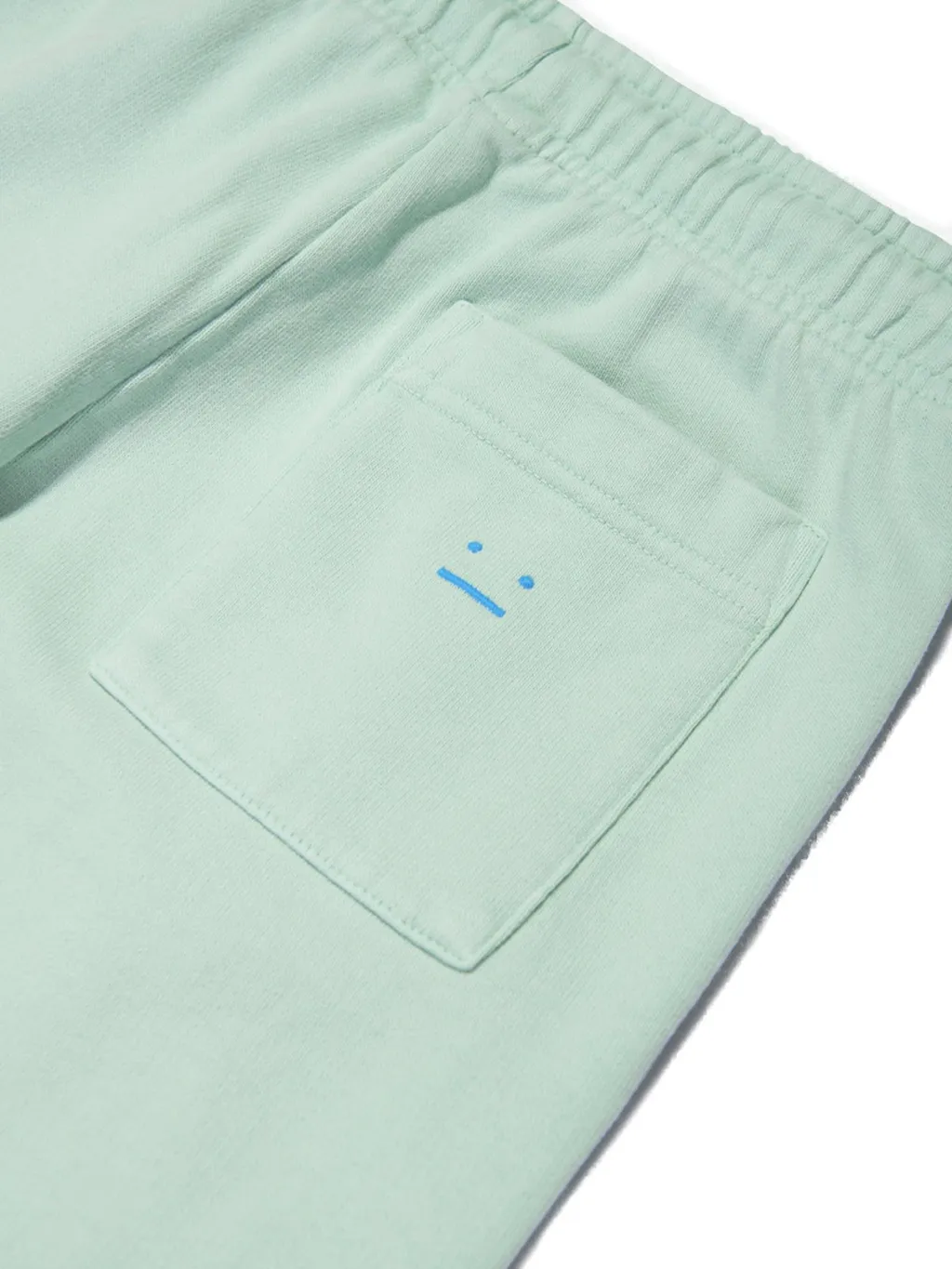 Face Motif Sweatpants