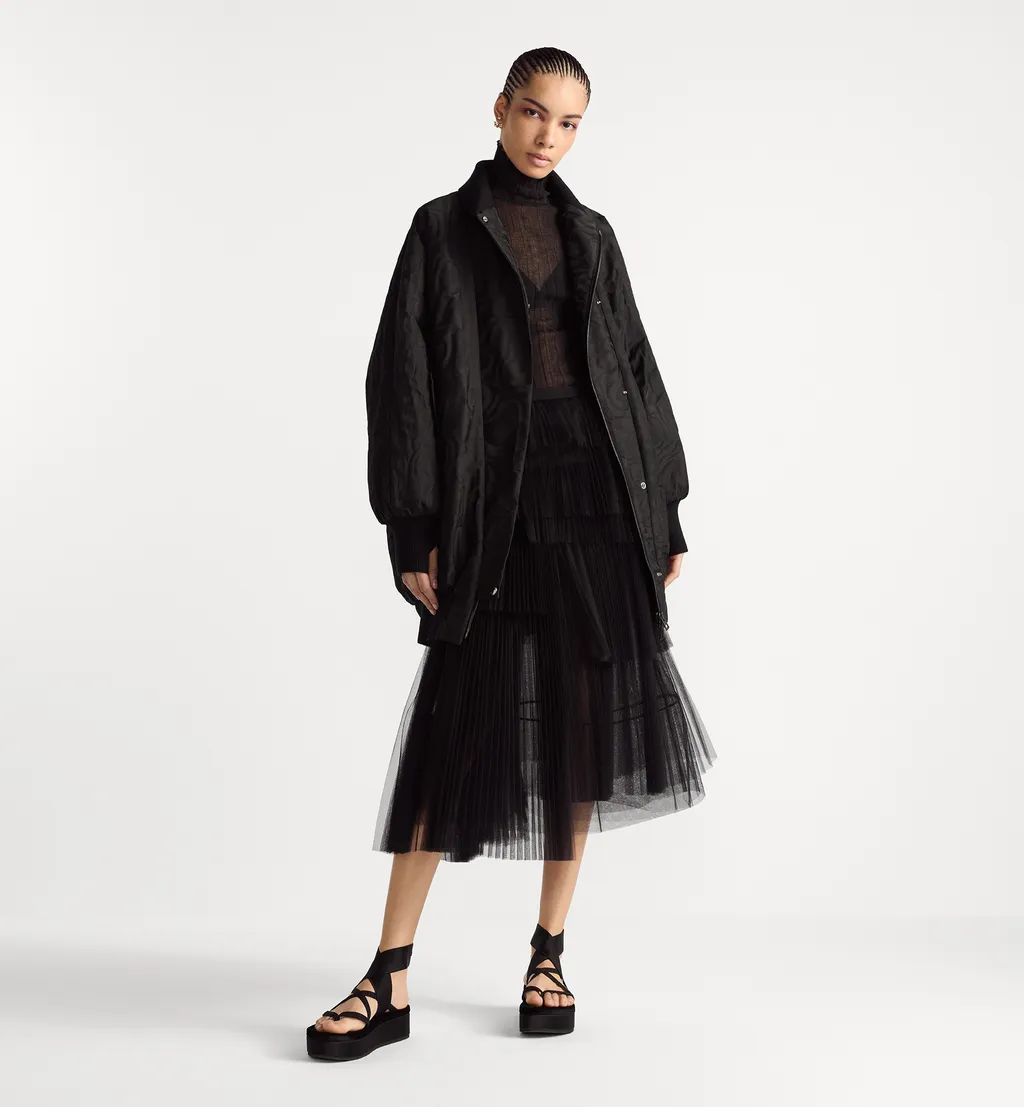 Mid-Length Asymmetric Pleated Skirt
