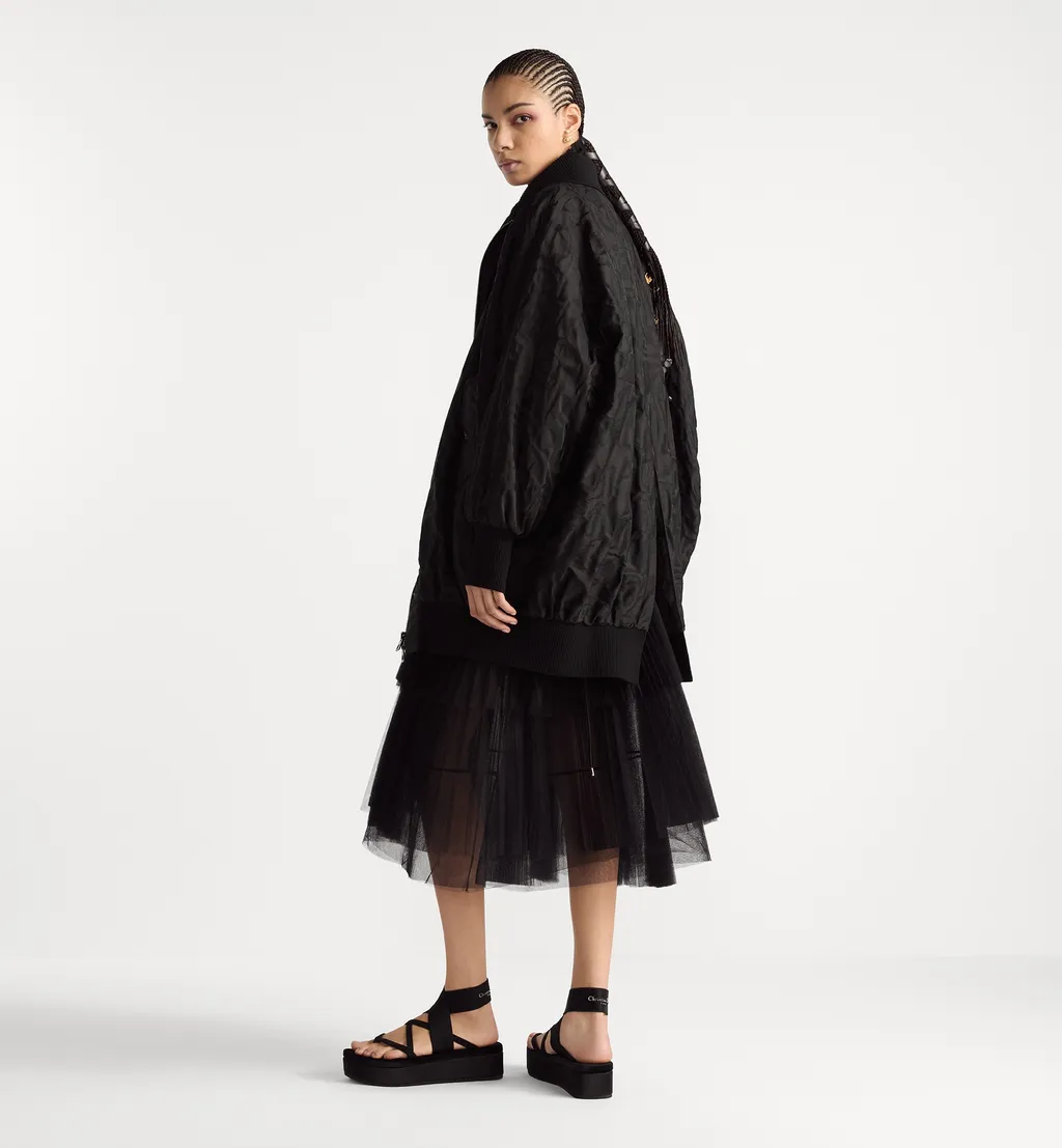 Mid-Length Asymmetric Pleated Skirt