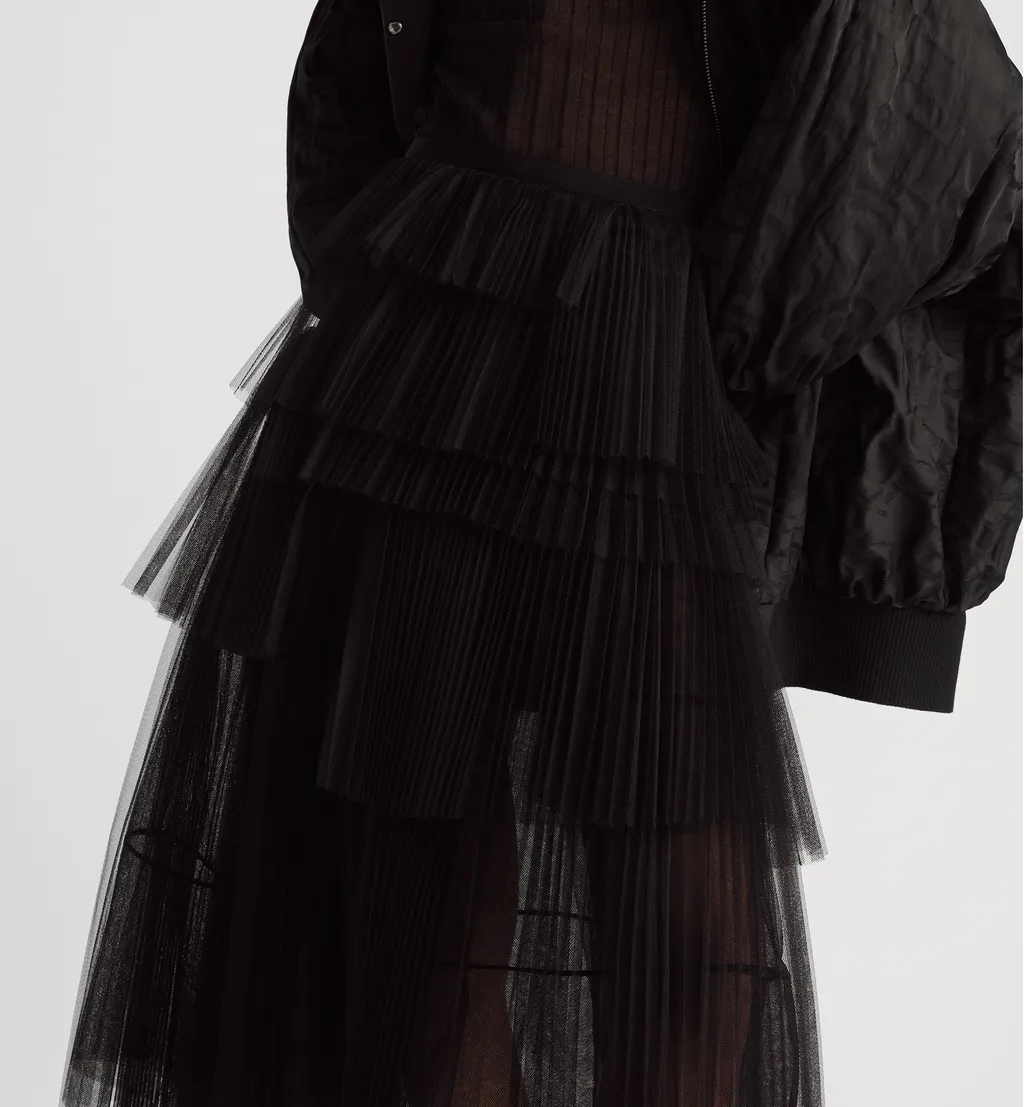 Mid-Length Asymmetric Pleated Skirt