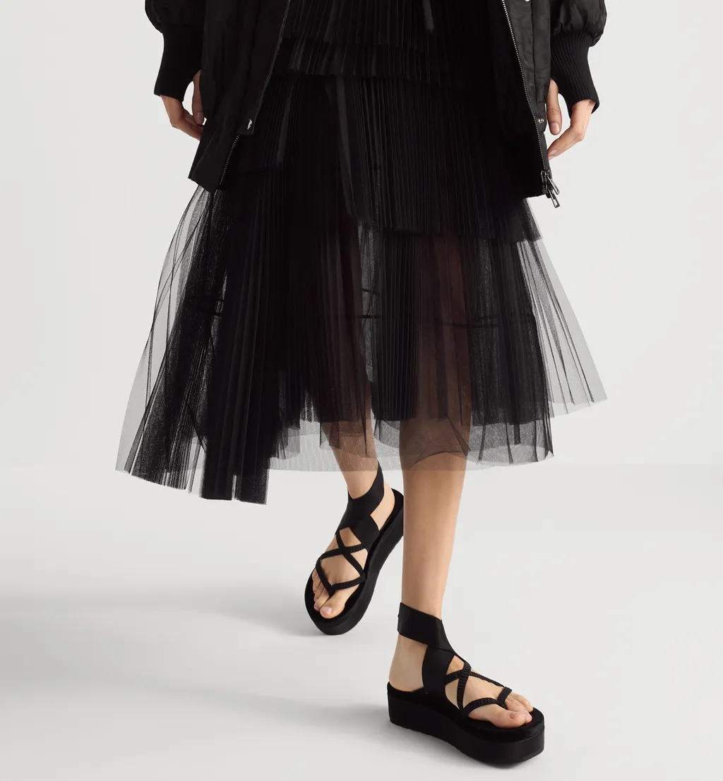 Mid-Length Asymmetric Pleated Skirt