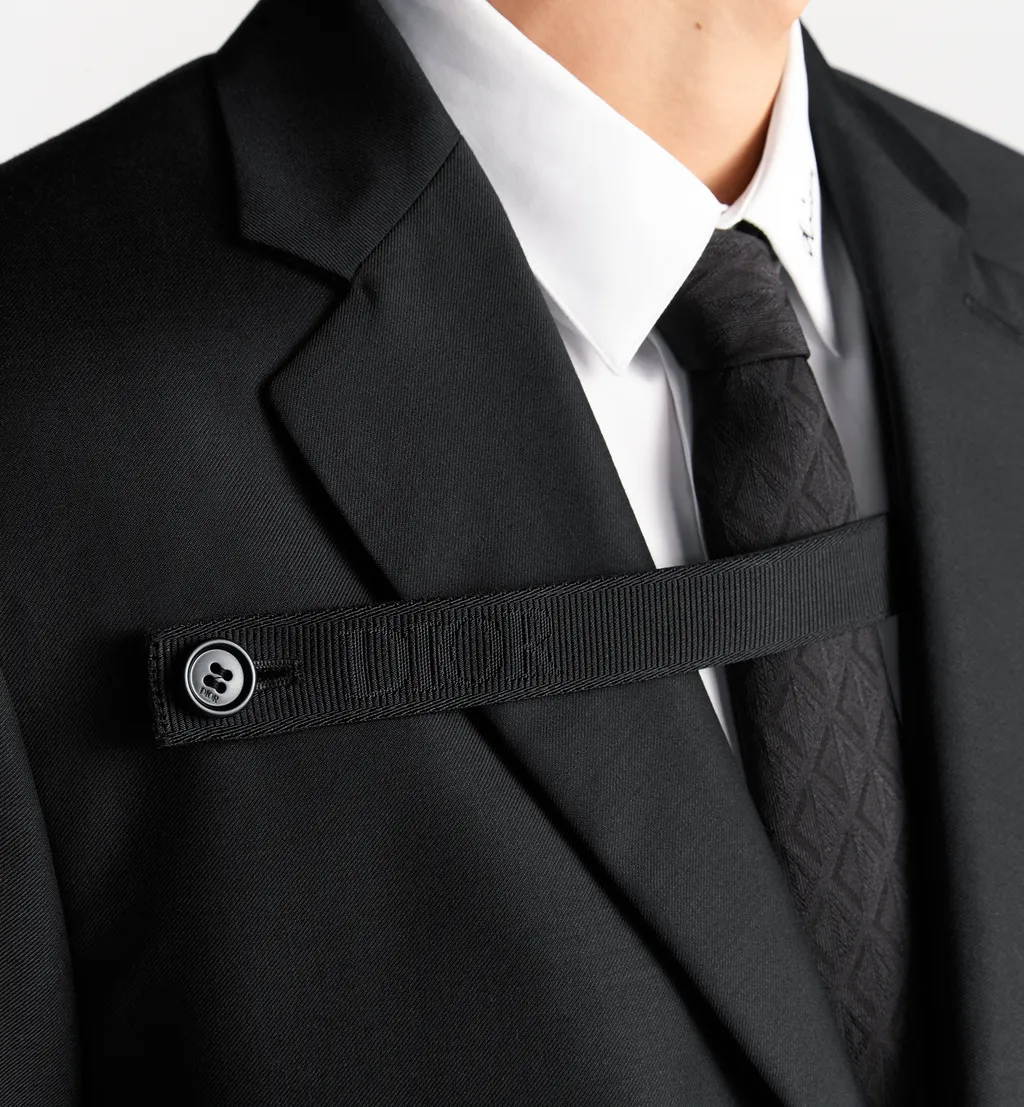 Jacket With Buttoned Strap