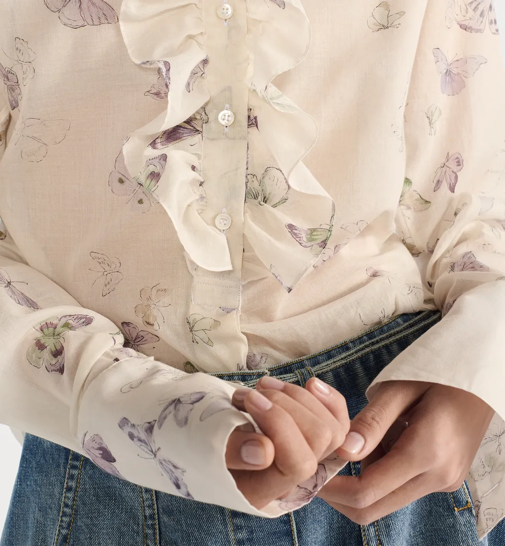 Blouse With Ruffled Neckline