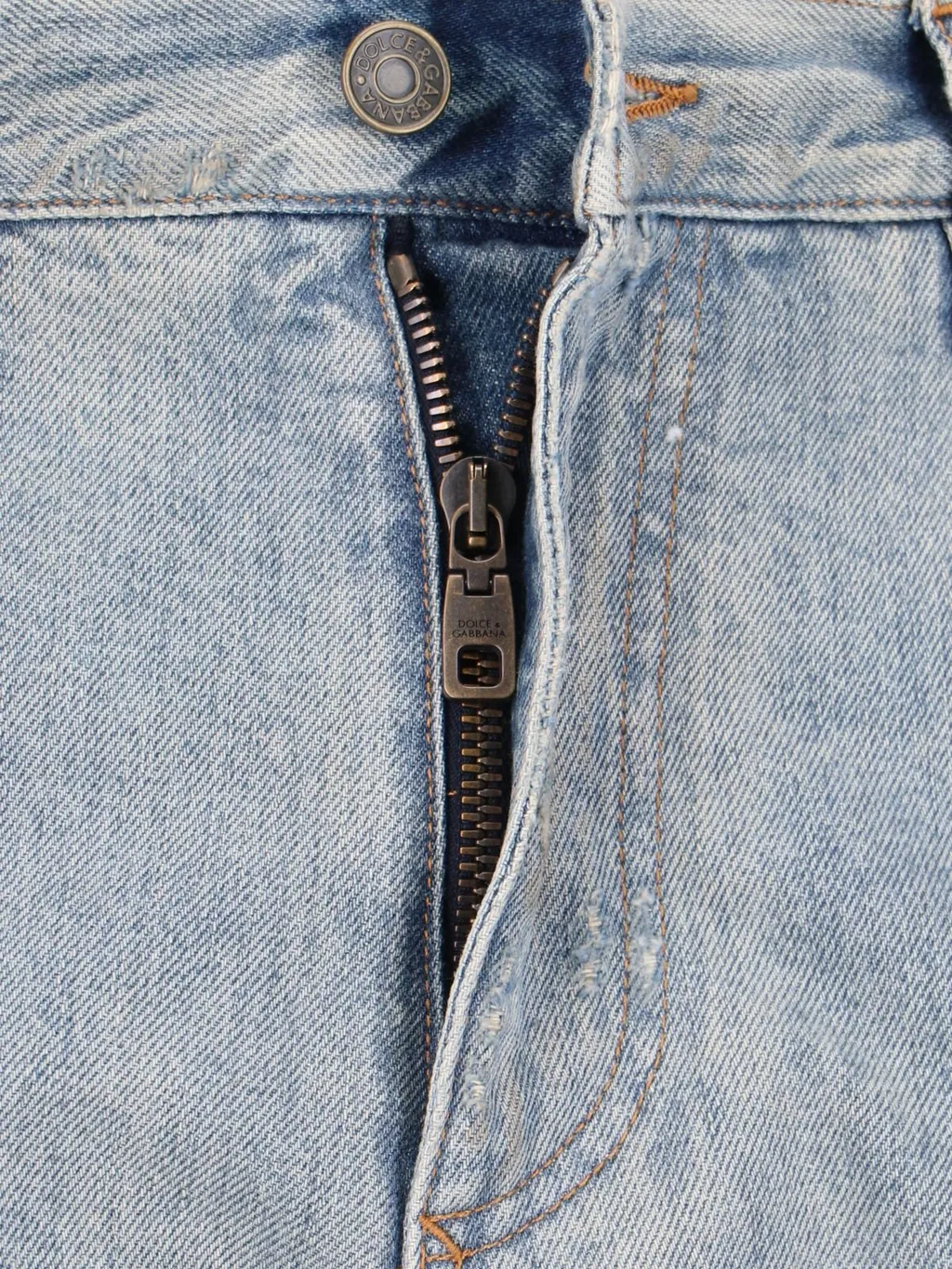 Dolce & Gabbana Logo Plaque Faded Effect Ripped Jeans
