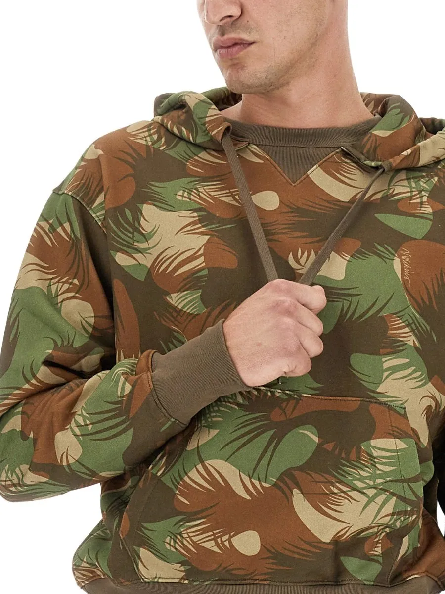 Moschino All-Over Printed Drawstring Sweatshirt