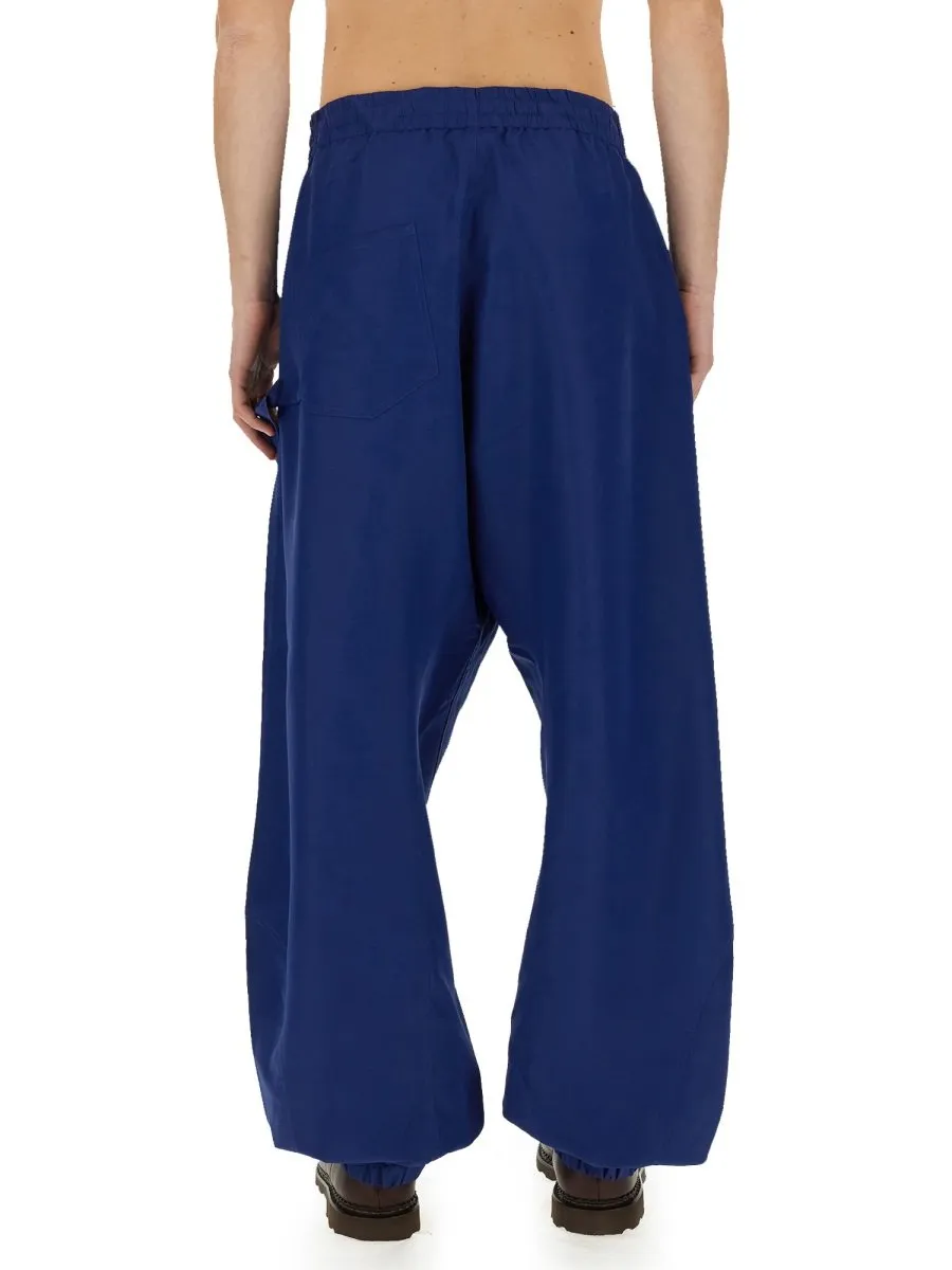 Jw Anderson Anchor Logo Printed Twisted Joggers