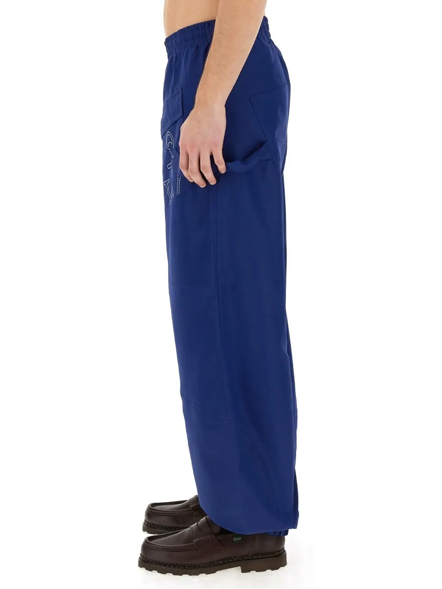 Jw Anderson Anchor Logo Printed Twisted Joggers