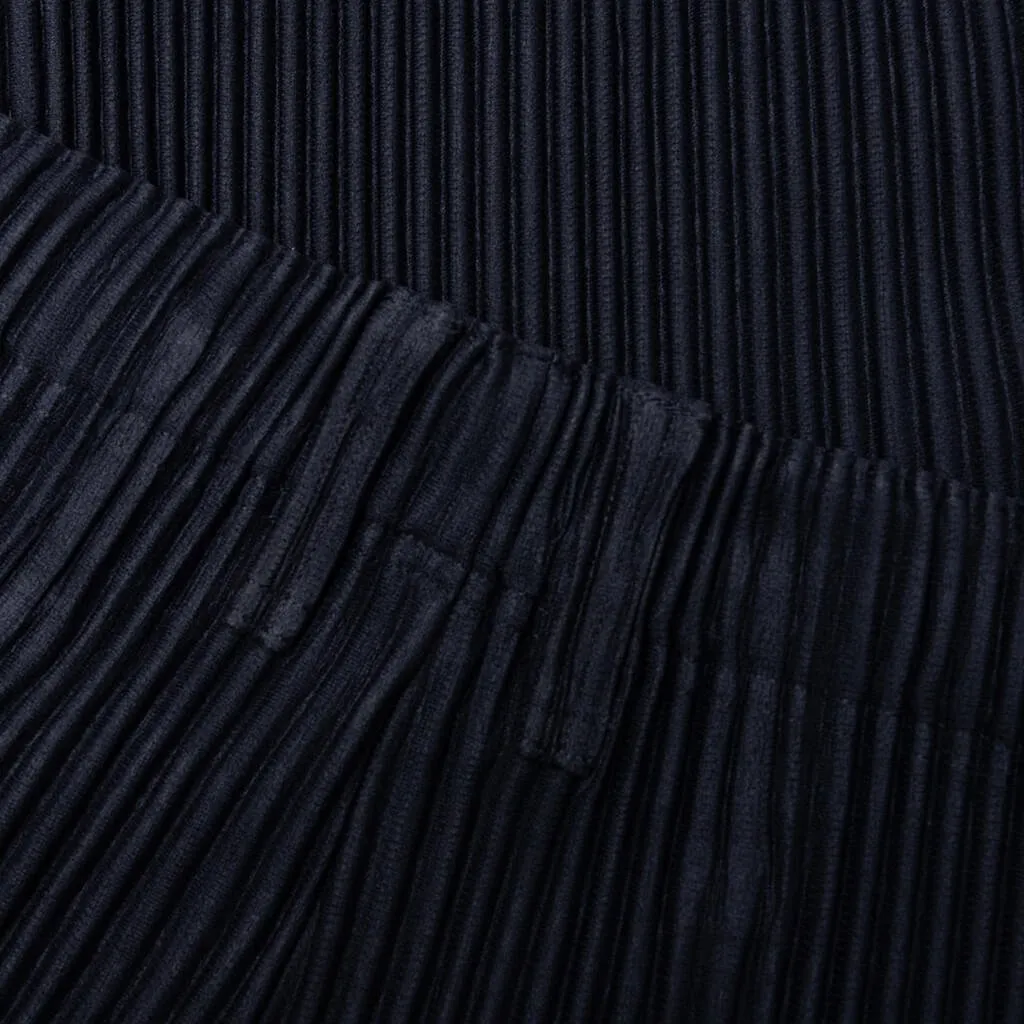 Homme Plissé Issey Miyake Pleated Tapered-Leg Pants