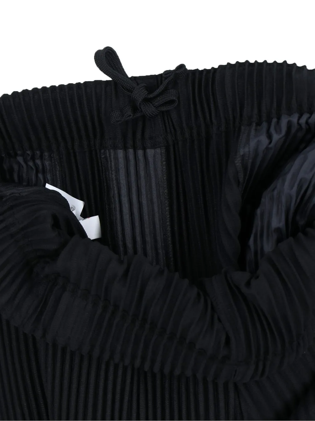 Homme Plissé Issey Miyake Pleated Tapered Leg Trousers