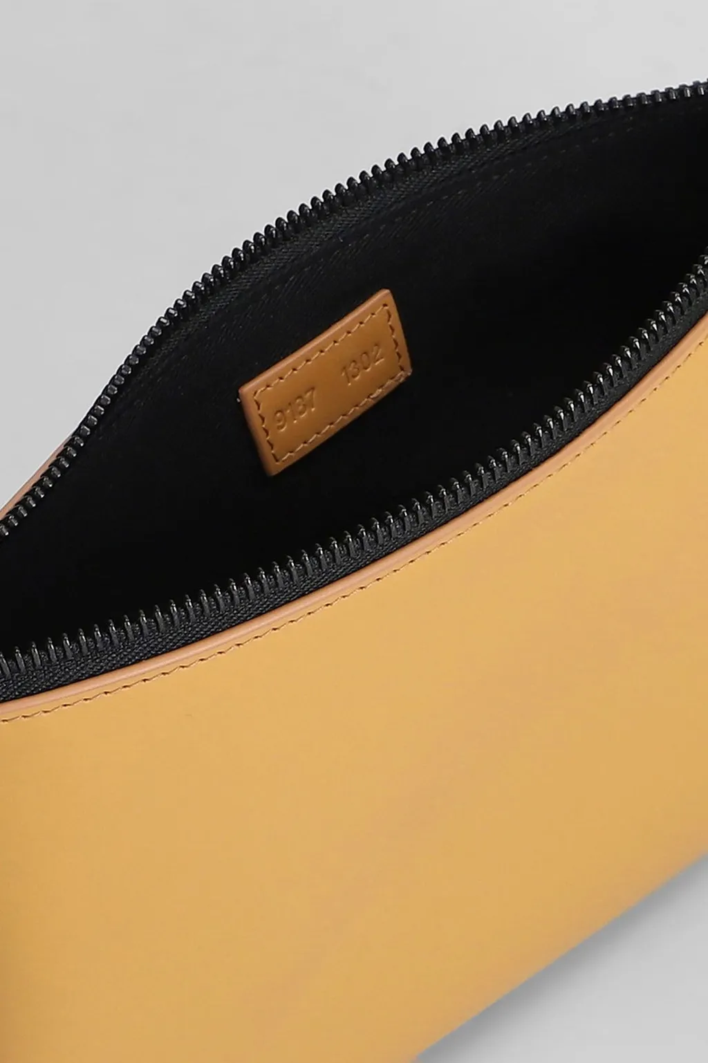 Common Projects Logo Stamp Zipped Clutch Bag