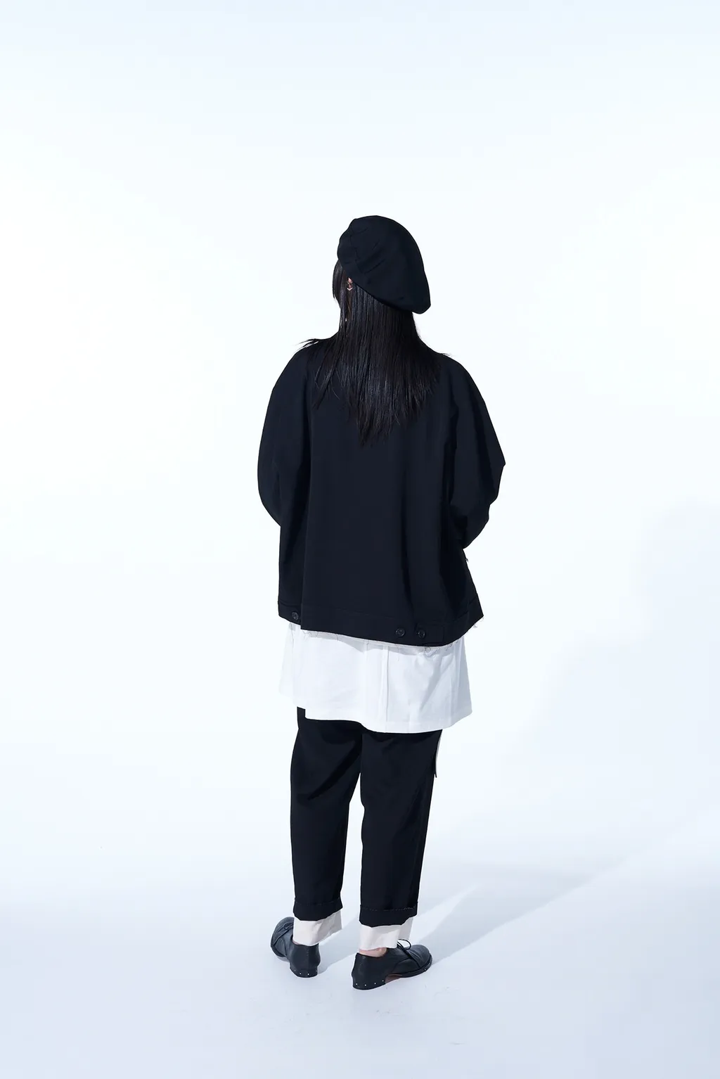 Washer Finished Wool Gabardine 2-Tuck Pants With Cut-Out Hem Design