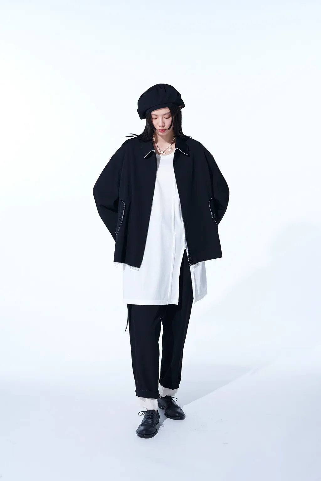 Washer Finished Wool Gabardine 2-Tuck Pants With Cut-Out Hem Design
