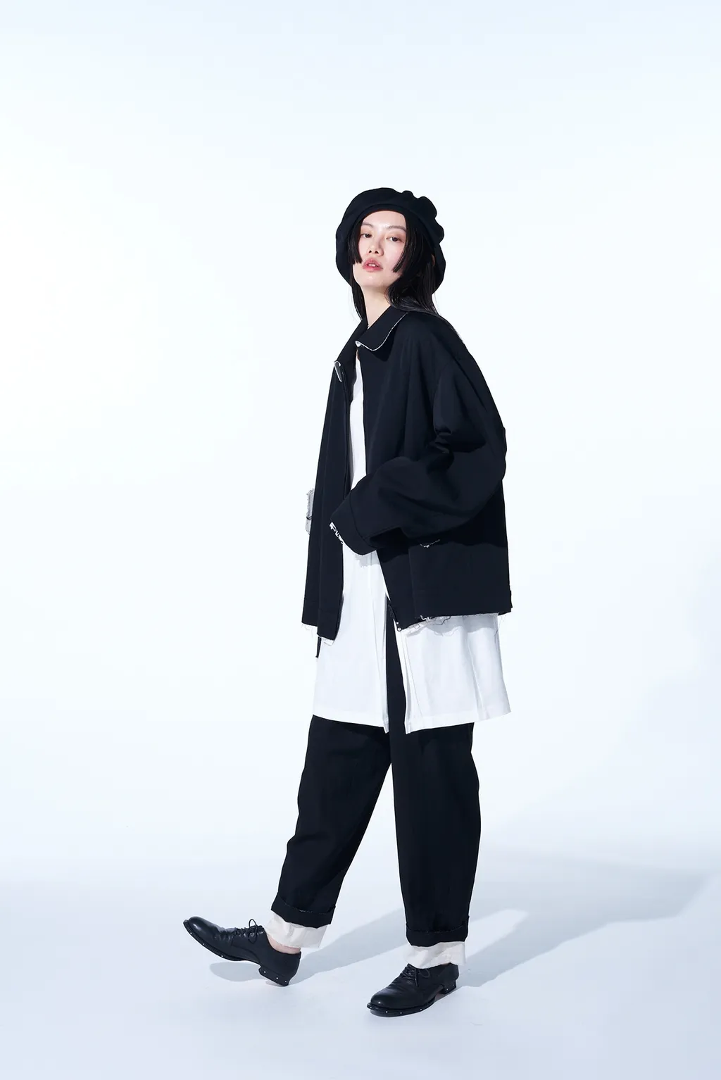 Washer Finished Wool Gabardine 2-Tuck Pants With Cut-Out Hem Design