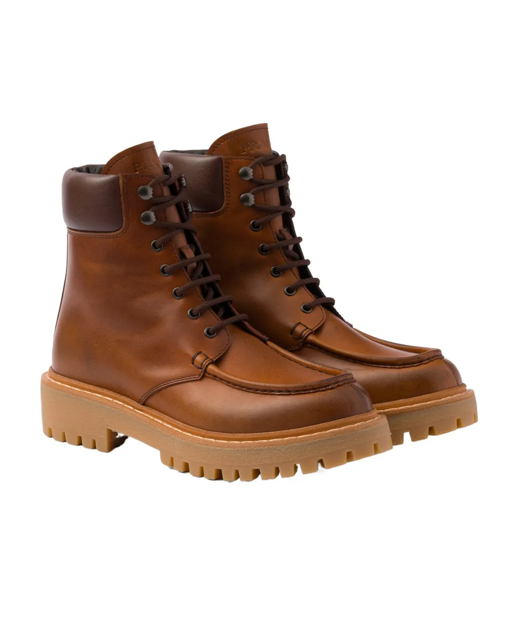 Prada Logo Detailed Round-Toe Ankle Boots