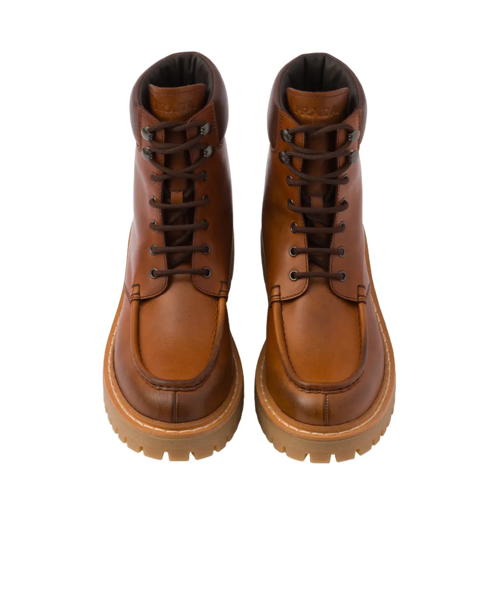 Prada Logo Detailed Round-Toe Ankle Boots
