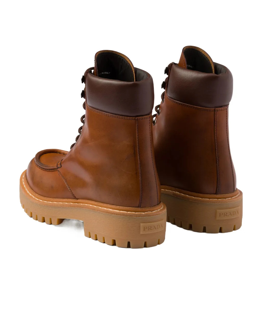 Prada Logo Detailed Round-Toe Ankle Boots