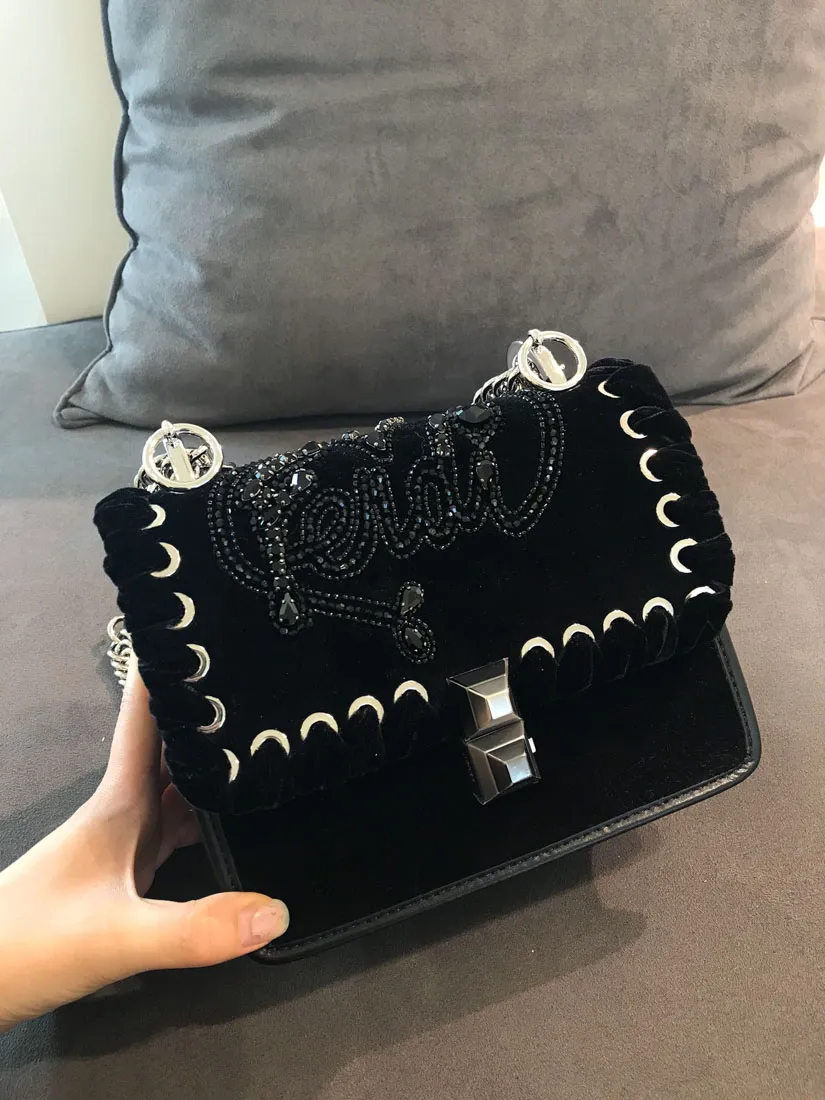 Kan I Logo Embellished Shoulder Bag