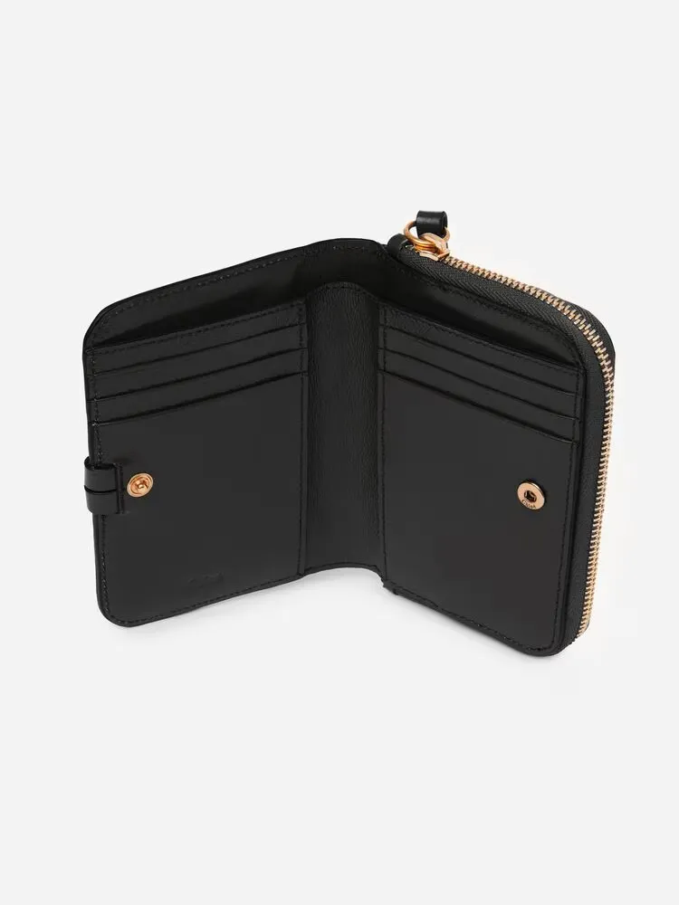 Alphabet Bifold Wallet In Shiny Leather