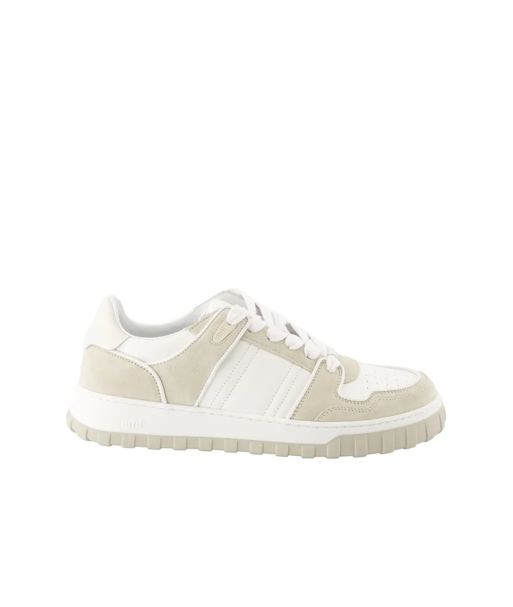 Ami Logo Embossed Low-Top Sneakers